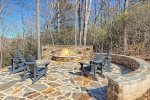 Custom stone firepit with walkways and patio